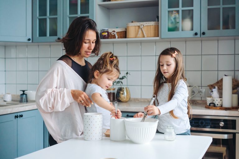 Happy family cook together in the kitchen