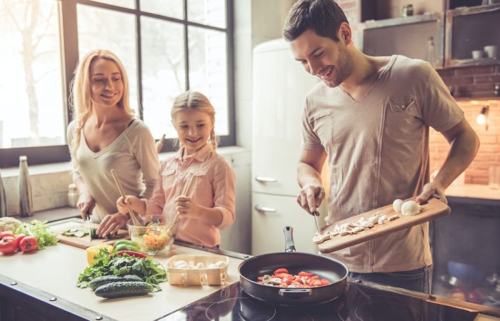 Young family cooking